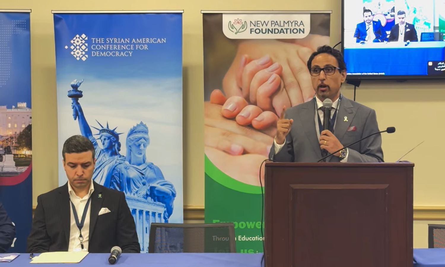 The President of the Alawite Association of the United States, Murhaf Ibrahim, during the Syrian-American Democracy Conference, May 15, 2025 (AAUS/Facebook)